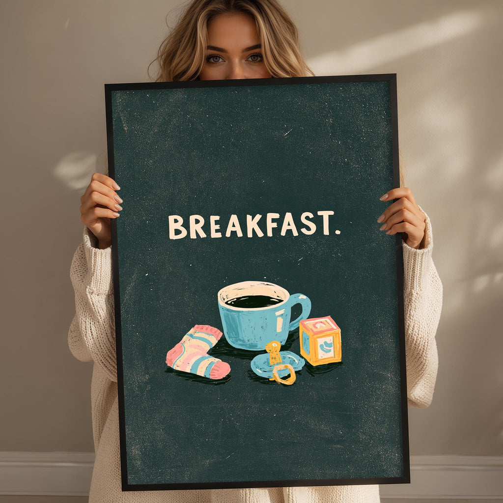A woman holding a framed poster with the word "BREAKFAST" written on it, along with illustrations of a cup of coffee, a baby bottle, and a pair of socks.