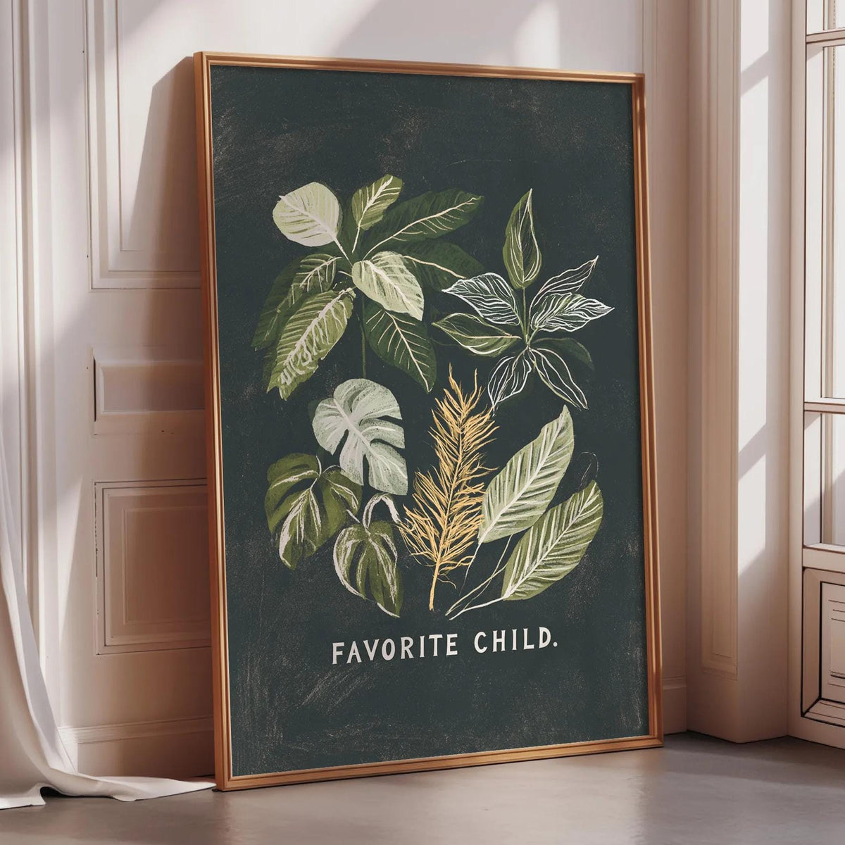 a framed poster with a black background and a collage of green leaves and plants. The text on the poster says "Favored Child."