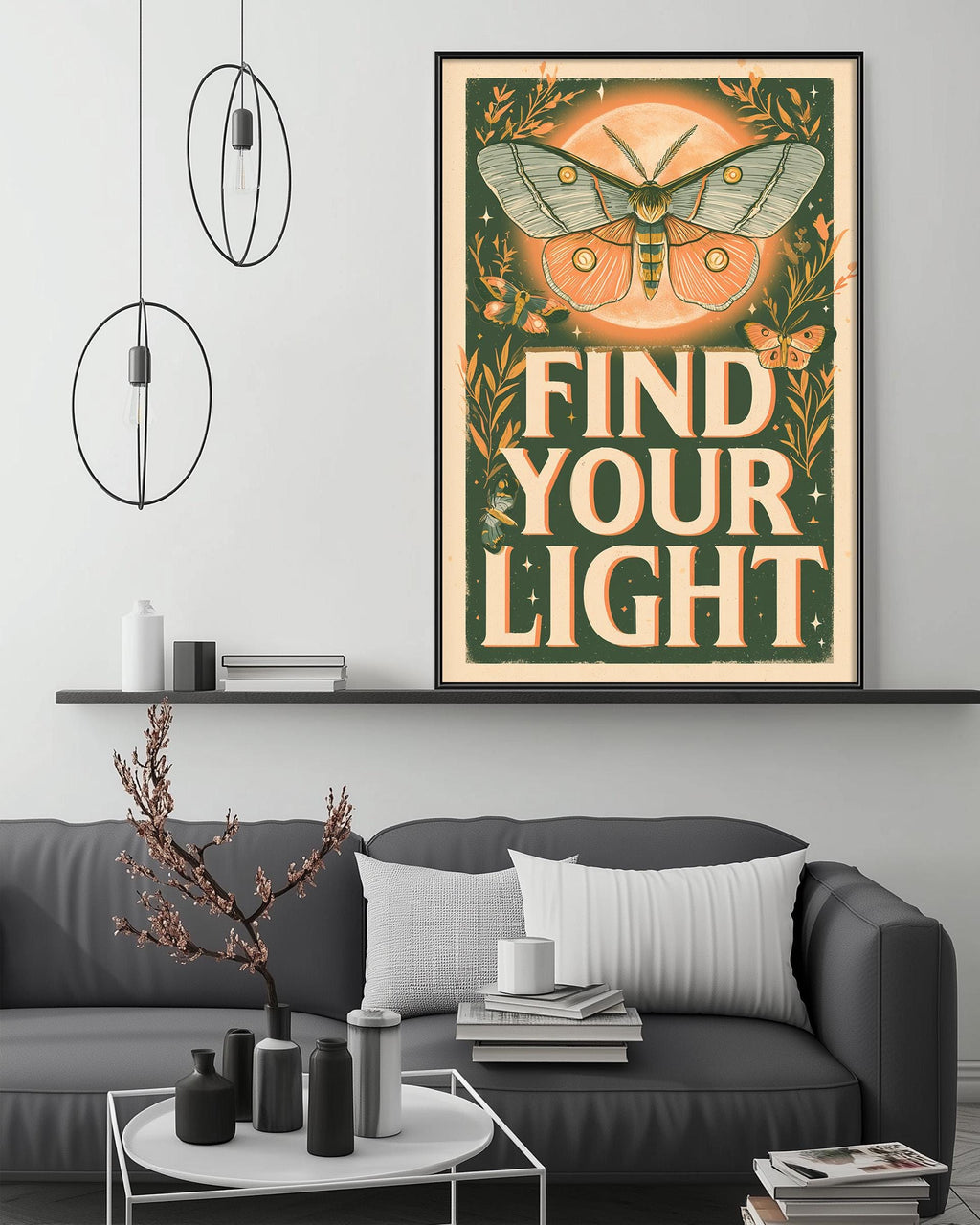 a living room with a gray couch, a coffee table, and a large framed poster with a butterfly and the text "Find Your Light" hanging on the wall above it.