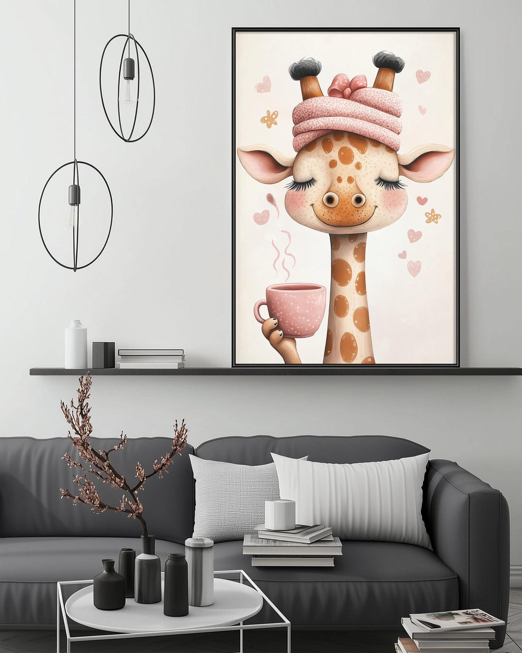 a cozy living room with a gray couch, a coffee table, and a large framed picture of a giraffe holding a cup of coffee.