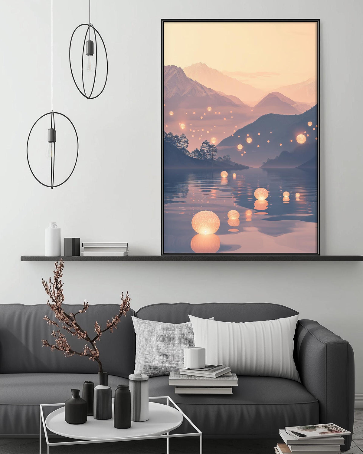a modern living room with a gray sofa, a coffee table, and a large framed landscape painting depicting a serene mountain scene with floating lanterns.