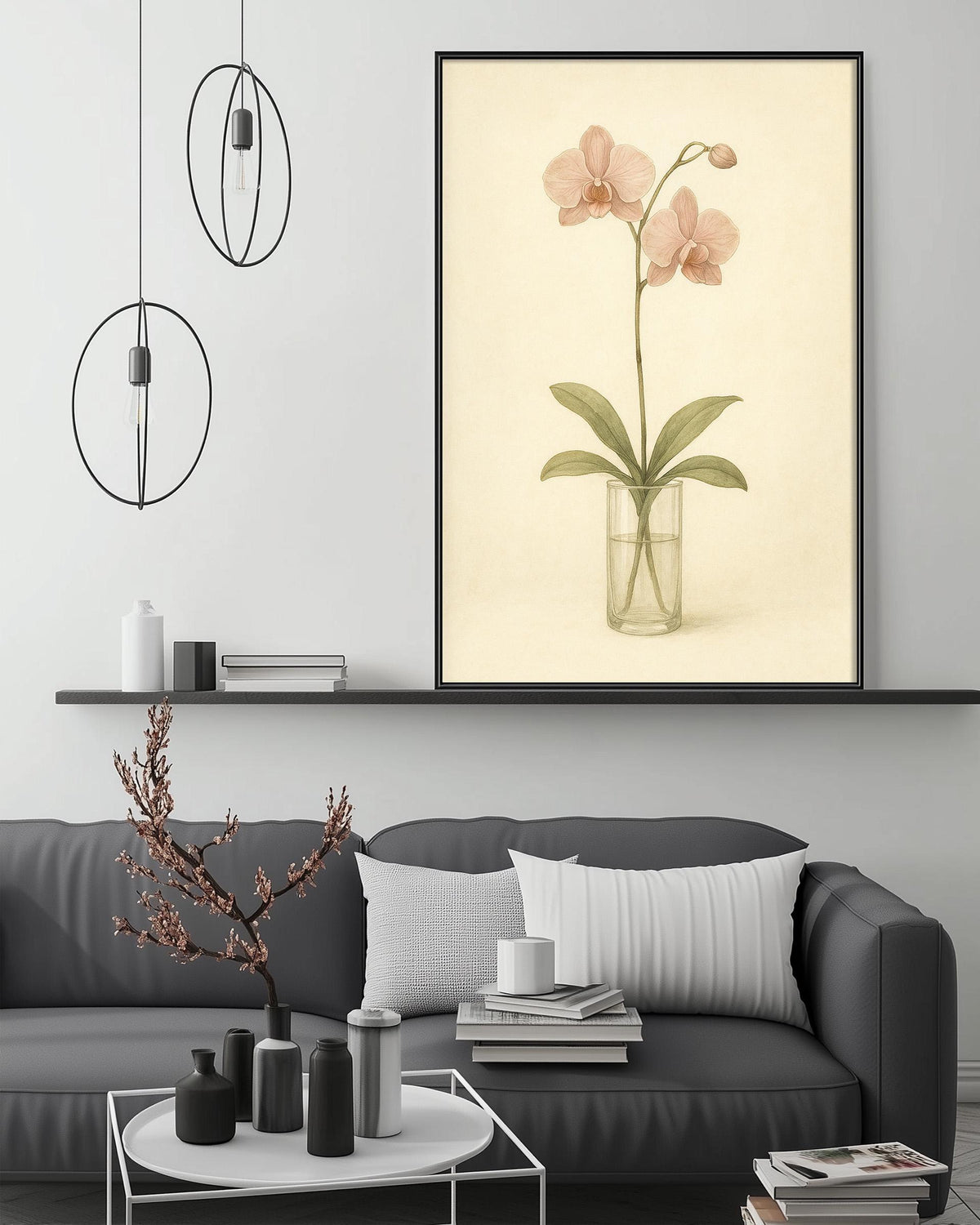 a living room with a gray sofa, a coffee table, and a framed picture of an orchid plant on the wall.