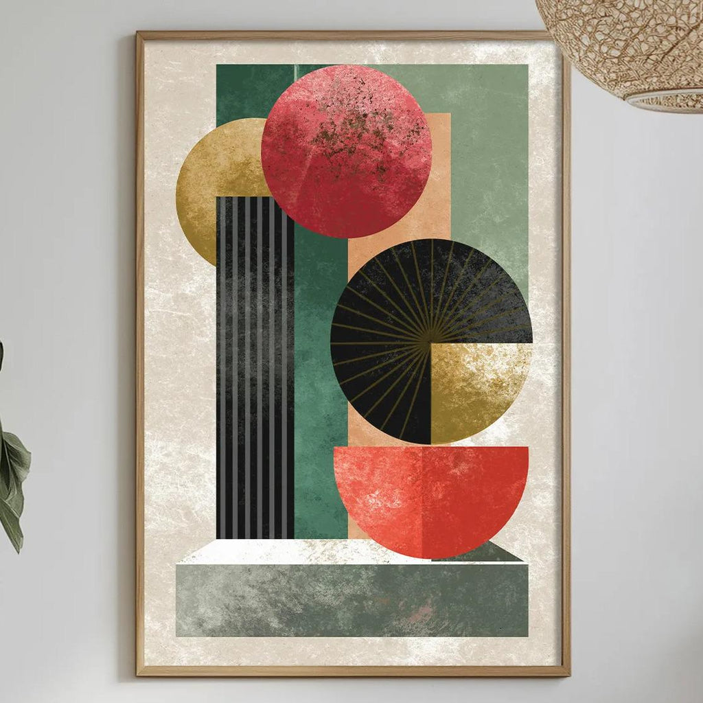 a modern art print hanging on a wall above a dining table with various decorative elements, including potted plants, vases, and bowls.