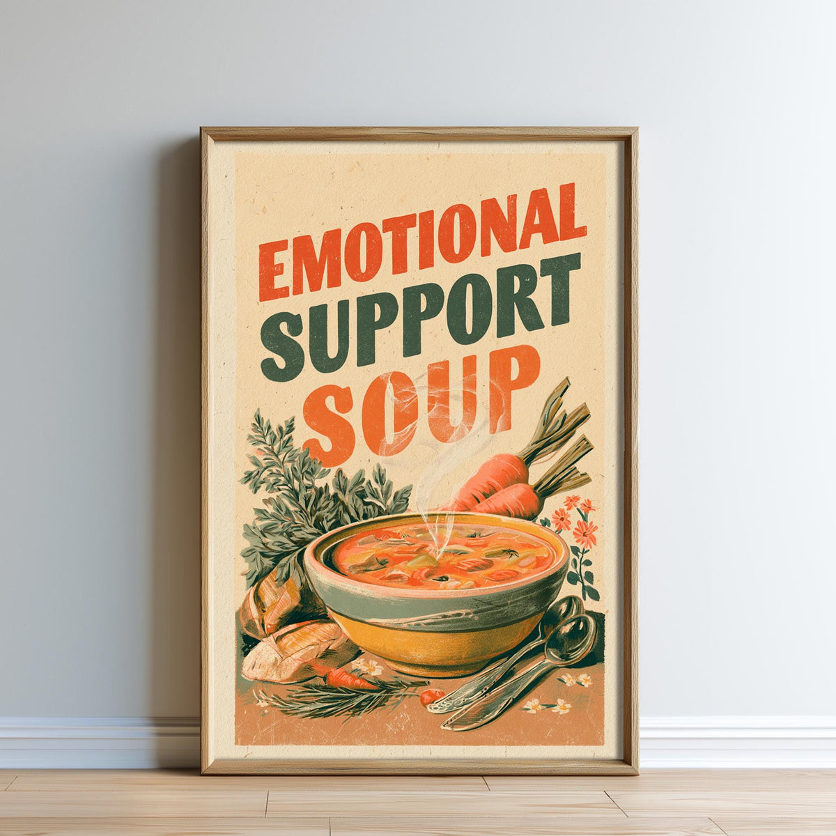 The image is a framed poster with a picture of a bowl of soup and various vegetables, along with the text "Emotional Support Soup" written on it.