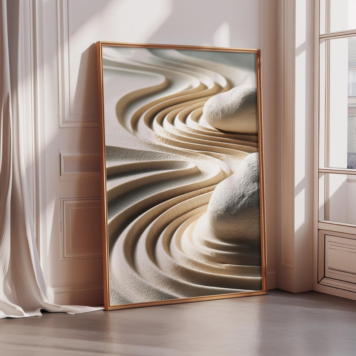 a large, framed picture of a sandy landscape with curved lines and shapes, creating a visually striking and abstract representation of the natural environment.