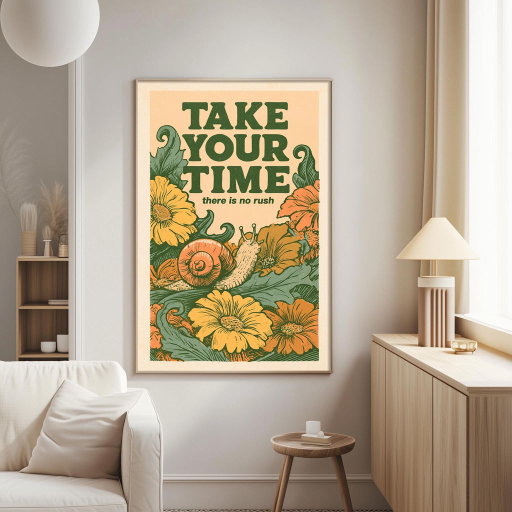 a framed poster with a vibrant floral design and the text "TAKE YOUR TIME there is no rush" displayed on a wall in a living room setting.