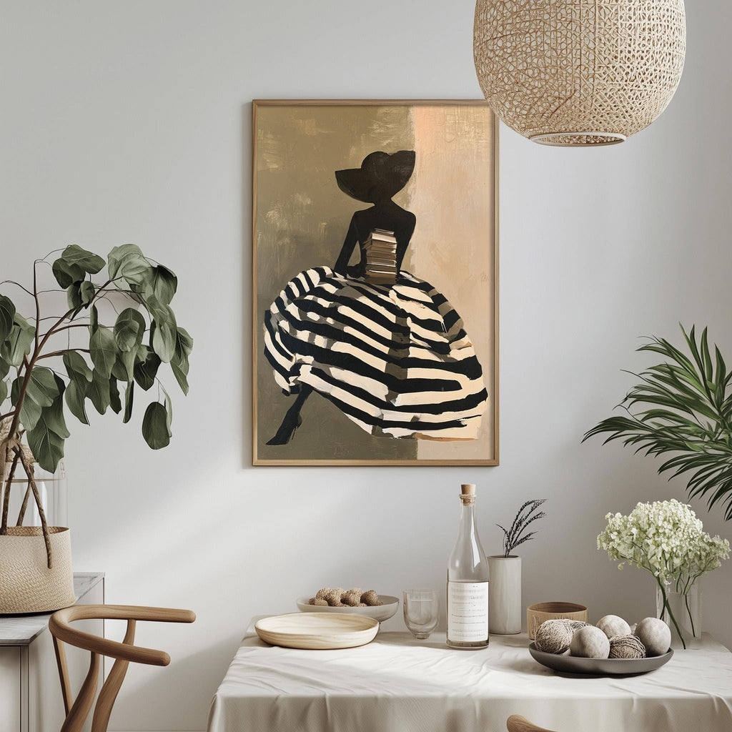 a dining table with a white tablecloth, a bowl of fruit, a bottle, and a vase with flowers. Above the table, there is a framed painting of a woman in a striped dress.