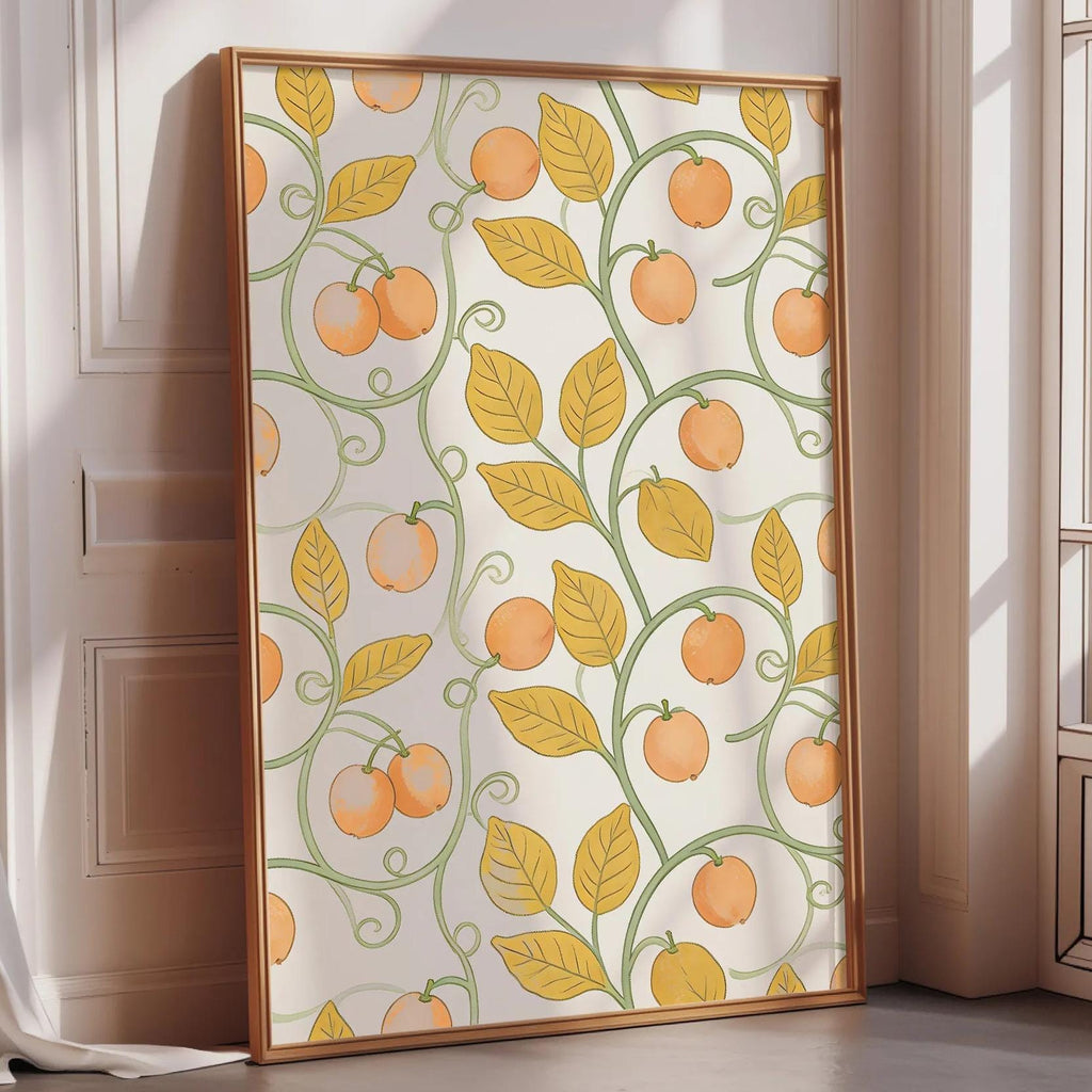 a large framed poster with a repeating pattern of orange and green leaves and small orange fruits, creating a vibrant and lively design.