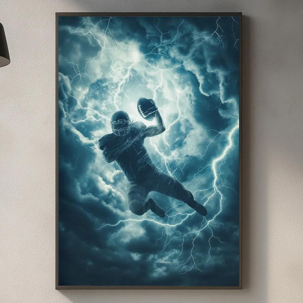 a framed poster of a football player in mid-air, surrounded by lightning and a stormy sky, hanging on a wall above a kitchen counter.