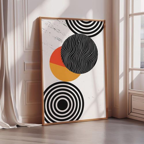 a large abstract art piece with a black and white color scheme, featuring circles and stripes in various sizes and orientations.