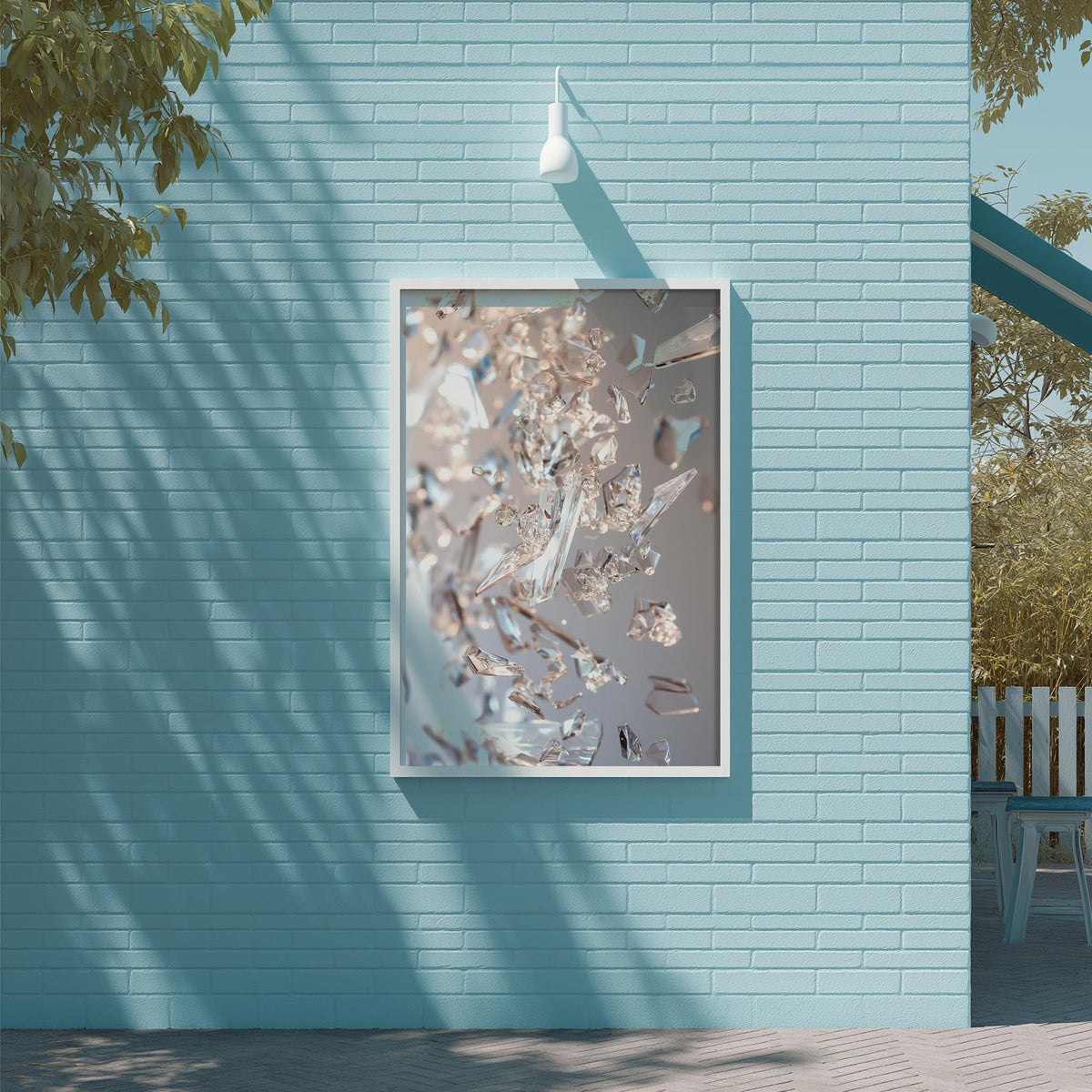 a blue brick wall with a framed picture of a crystal or glass piece hanging on it.