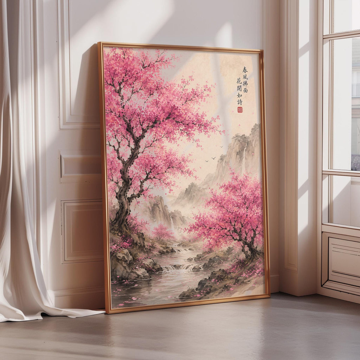 A framed painting depicting a serene landscape with a tree in full bloom and a stream flowing through the scene, set against a mountainous backdrop.