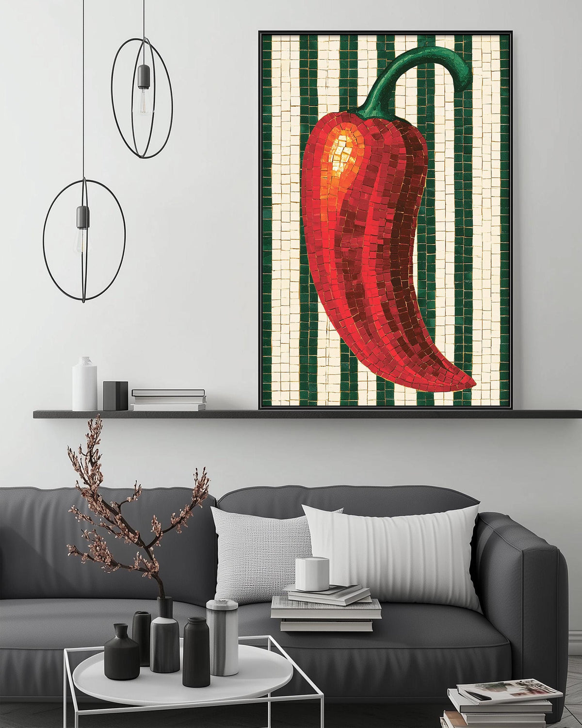 a modern living room with a gray sofa, a coffee table, and a large framed mosaic artwork depicting a red pepper on the wall.