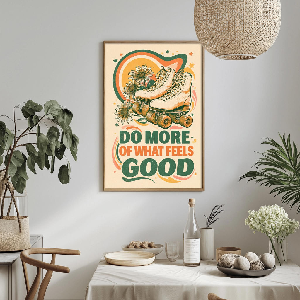 a framed poster with a rollerblading design and the text "Do more of what feels good" hanging on a wall above a dining table with various items on it.