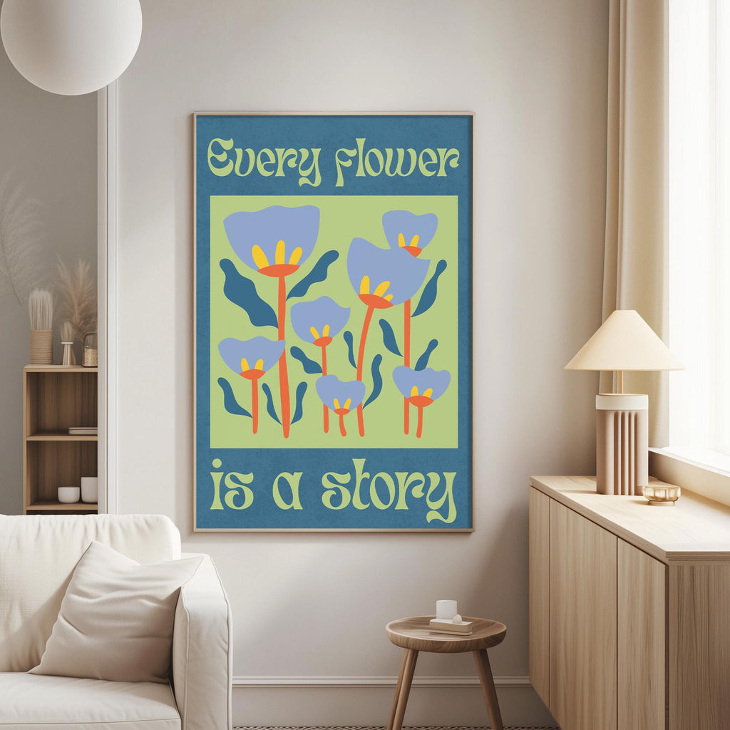 a poster with a floral design and the text "Every flower is a story" hanging on a wall in a living room.