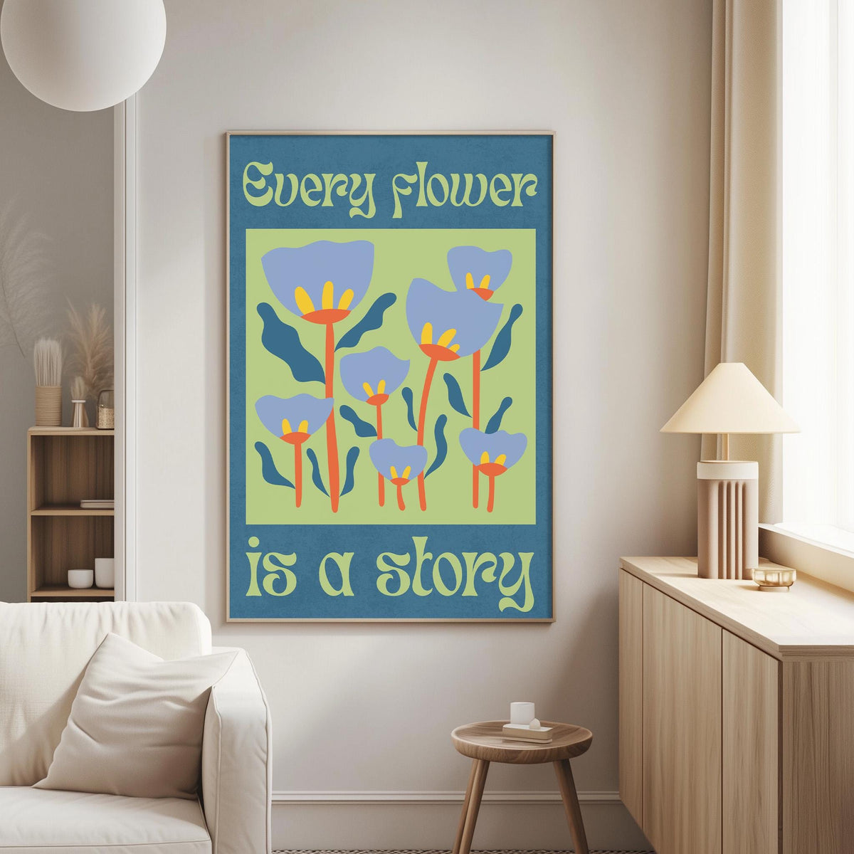 a poster with a floral design and the text "Every flower is a story" hanging on a wall in a living room.