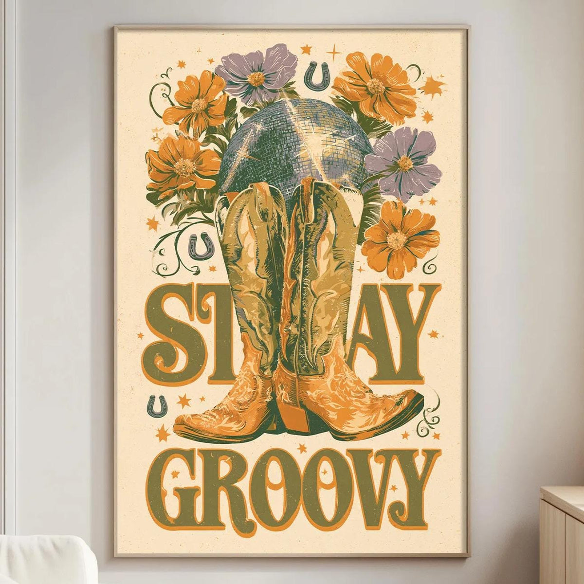 a poster with a cowboy boot and flowers, along with the text "STAY GROOVY" displayed prominently.