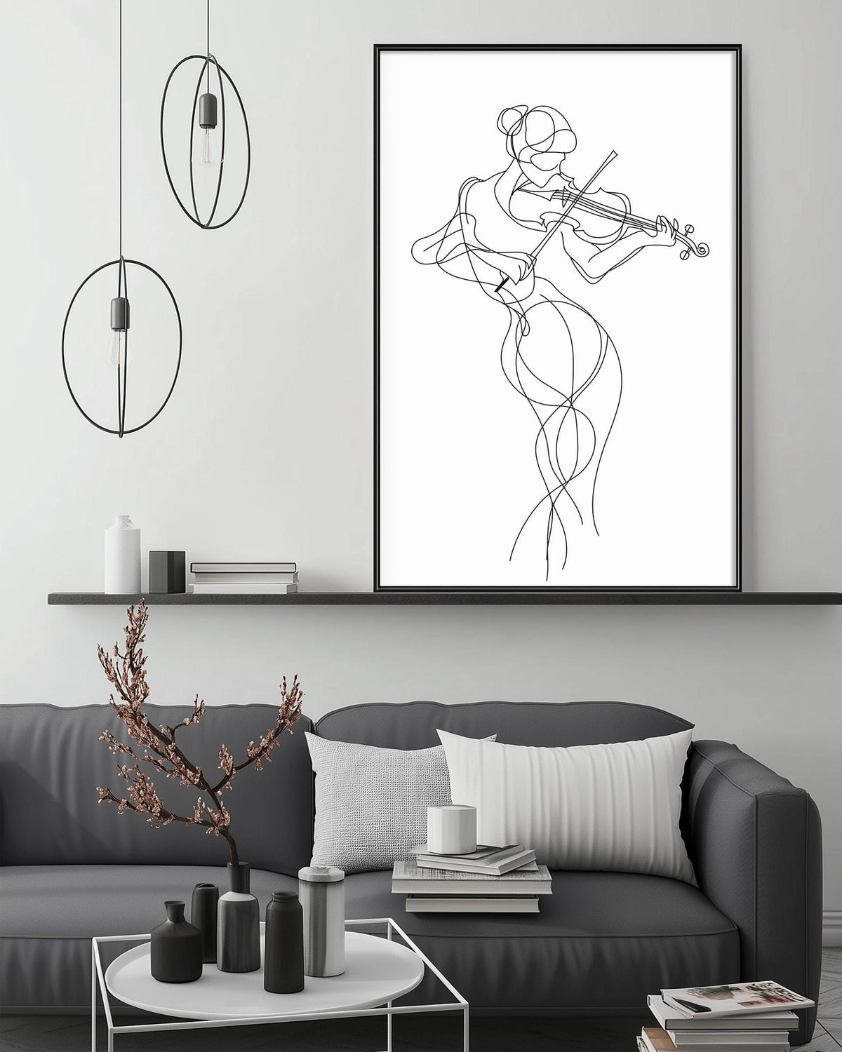 a modern living room with a gray sofa, a coffee table, and a framed abstract drawing of a woman playing a violin. The room has a minimalist and contemporary design, with a black and white color scheme and a few decorative elements such as a potted plant and a vase.
