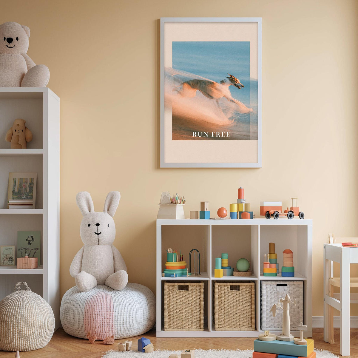 a cozy and colorful children's bedroom with a white bookshelf, a stuffed rabbit, and a toy train set. The walls are painted a light peach color, and there is a framed poster of a dog running in the background.