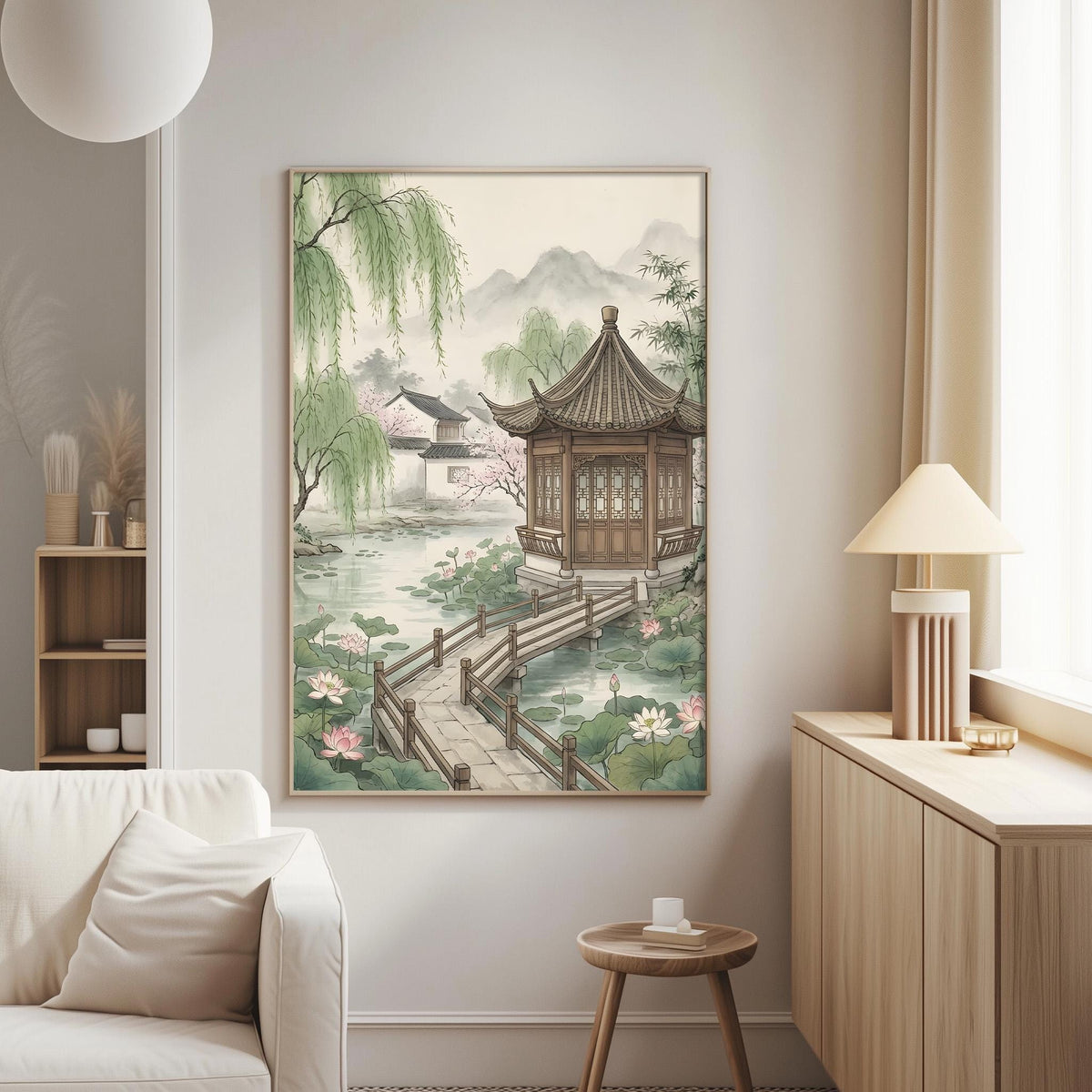 a serene and tranquil living room with a large painting of a traditional Chinese pavilion hanging on the wall. The painting features a wooden pavilion surrounded by a pond with lotus flowers, a wooden bridge, and a lush garden. The room is furnished with a white sofa, a wooden side table, and a lamp, creating a harmonious and peaceful atmosphere.