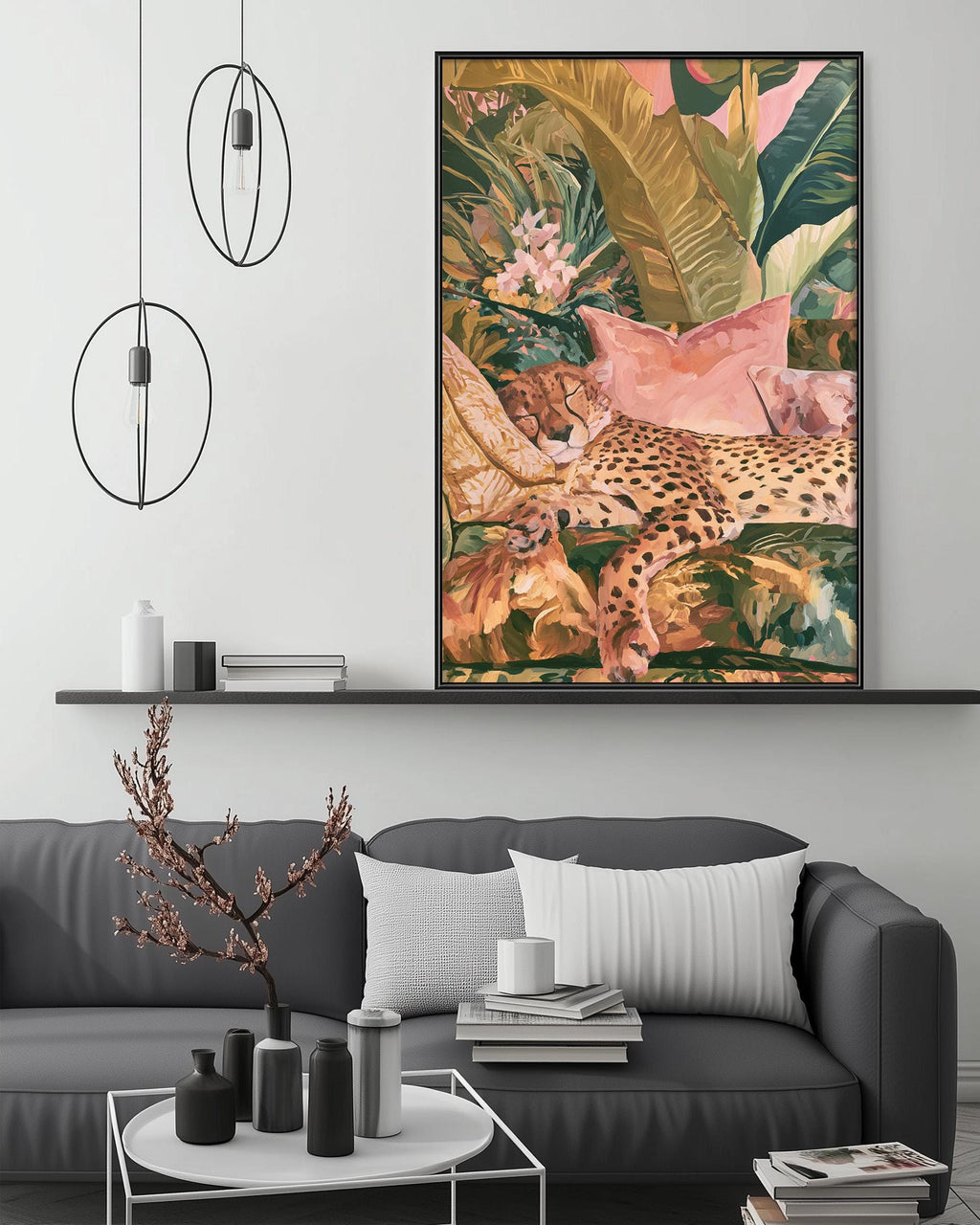 a large, colorful painting of a leopard resting on a bed of flowers, hanging on a wall above a gray couch in a living room setting.