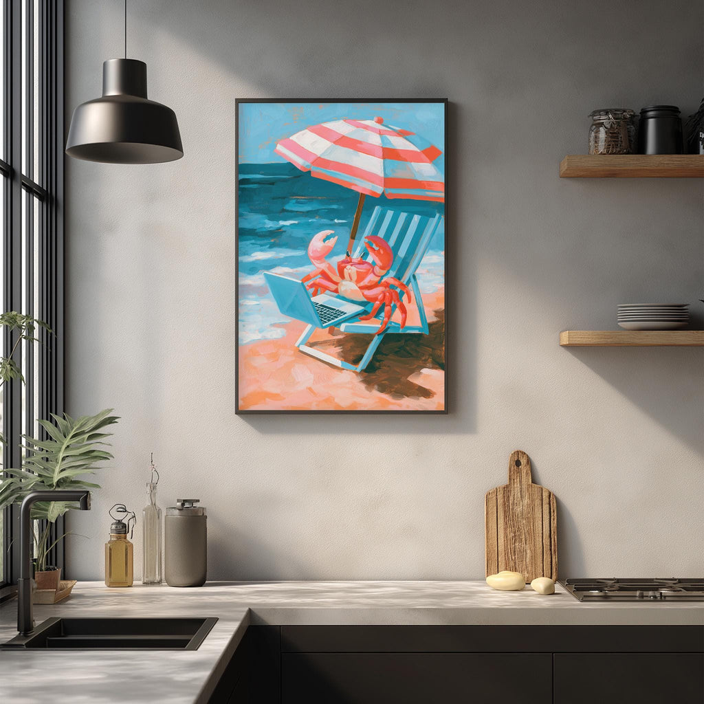 a framed painting of a crab sitting in a beach chair under an umbrella, with a laptop on the chair. The painting is hung on a wall above a kitchen counter with various kitchen items such as a cutting board, a bottle, and a bowl.
