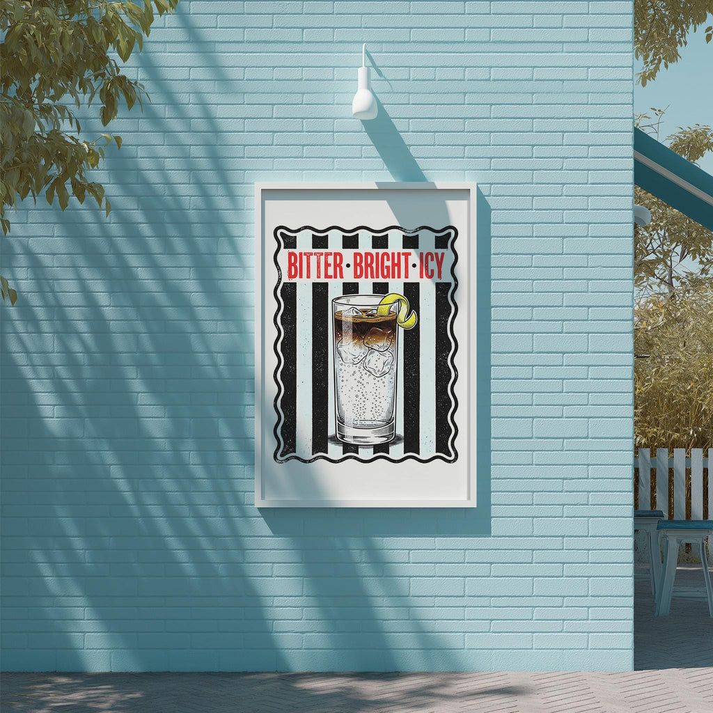 a poster with a picture of a drink and the text "BITTER-BRIGHT-ICY" on a blue brick wall.