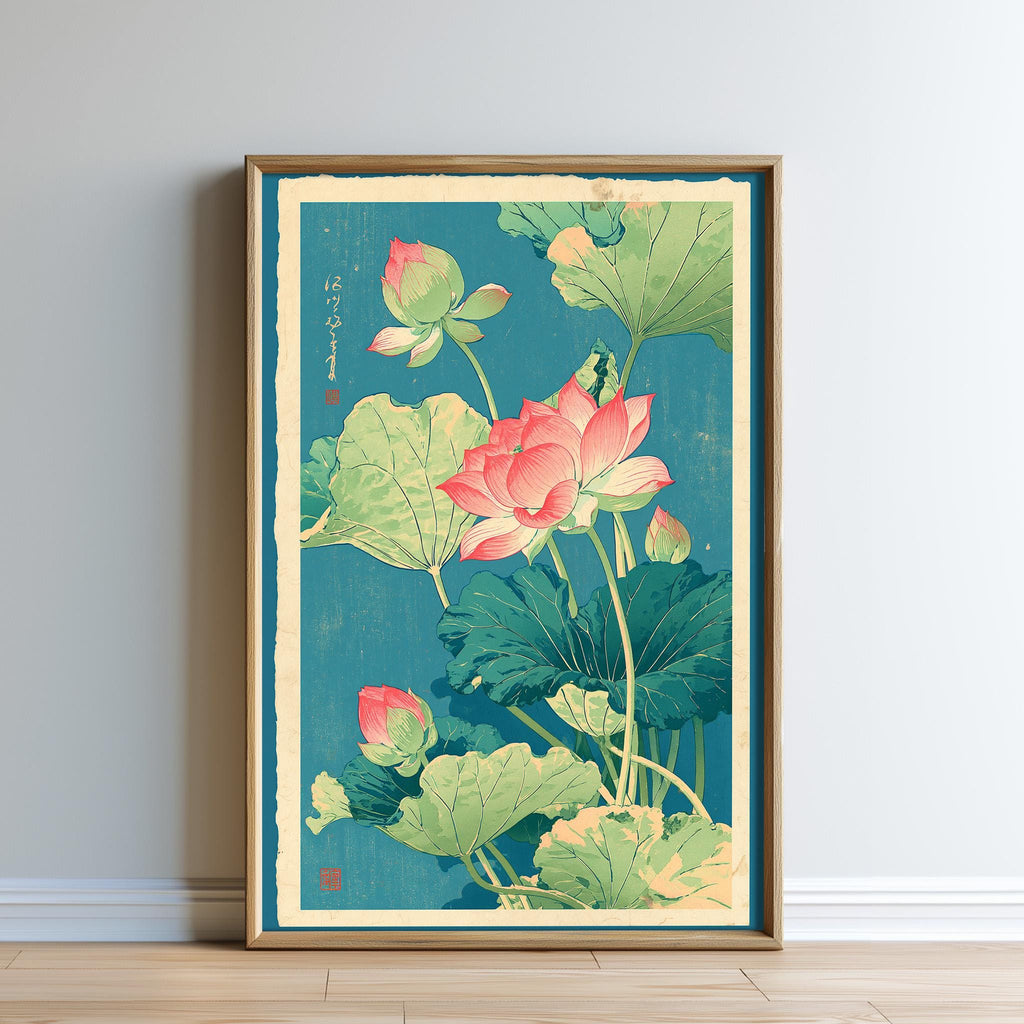 The image is a framed print of a vibrant illustration of lotus flowers and leaves, featuring a mix of pink and green colors.