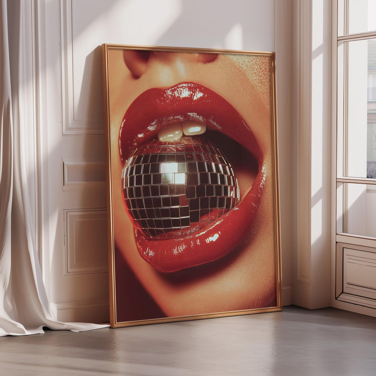 A large framed poster featuring a close-up of a person's lips with a disco ball inside, creating a striking and bold visual effect.
