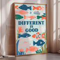 a poster with a colorful illustration of fish and plants, along with the text "DIFFERENT IS GOOD" displayed prominently.