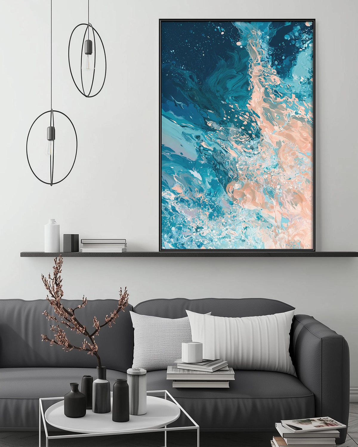a modern living room with a gray sofa, a coffee table, and a large abstract painting hanging on the wall above the sofa.