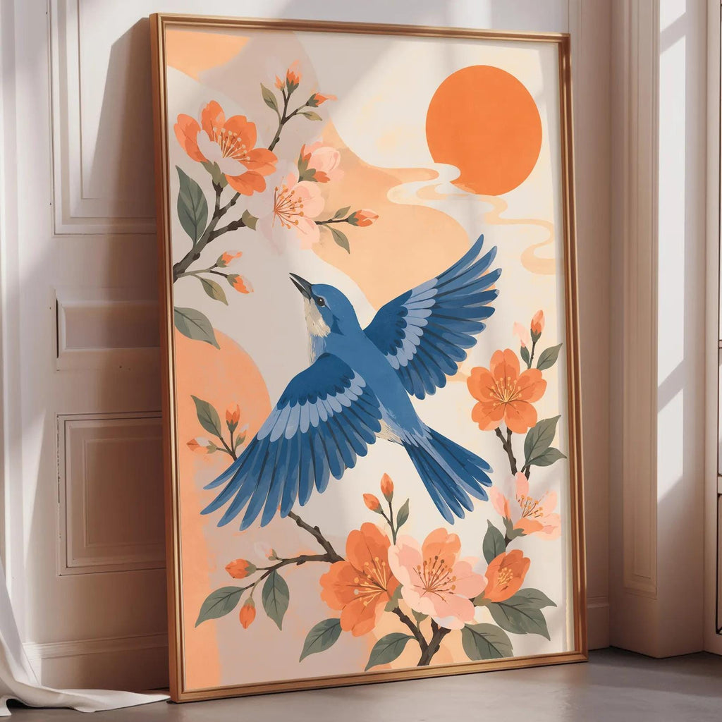A framed illustration of a blue bird in flight, surrounded by orange flowers and a large orange sun in the background.