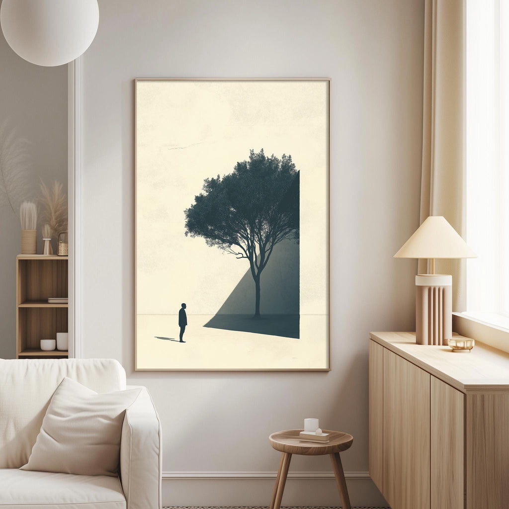a minimalist living room with a large framed artwork of a tree on the wall, a white sofa, a wooden side table, and a lamp on a wooden cabinet.