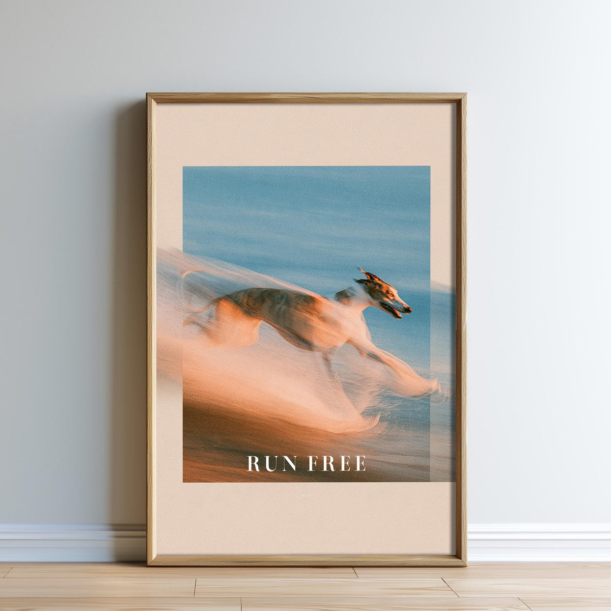 The image is a framed poster with a blurred dog running in the background, set against a blue sky.