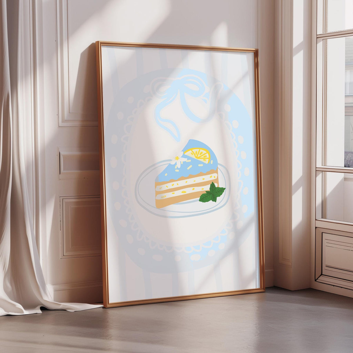 A framed illustration of a slice of cake with a lemon on top, placed on a white wall.