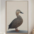 a large framed picture of a duck on a wall in a living room.