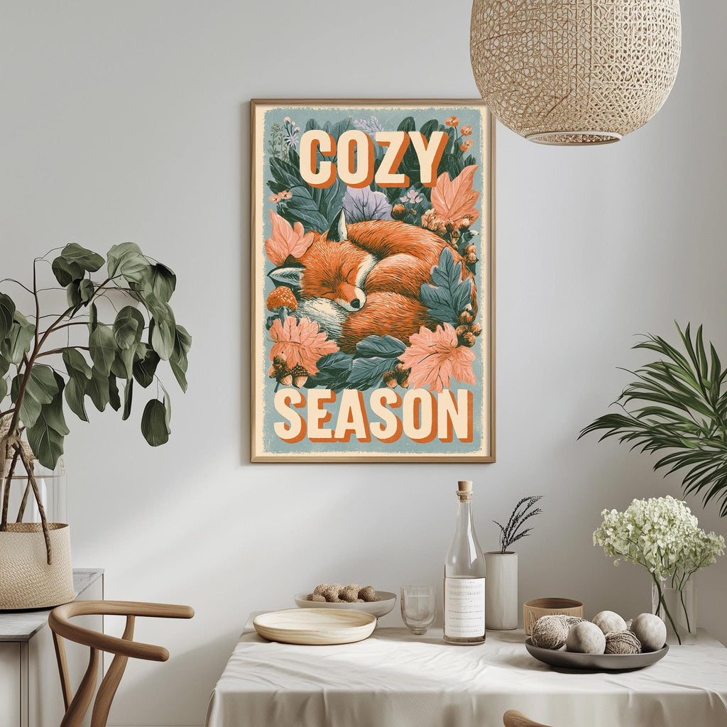 a cozy season poster hanging on a wall, surrounded by potted plants and a dining table with various items on it.