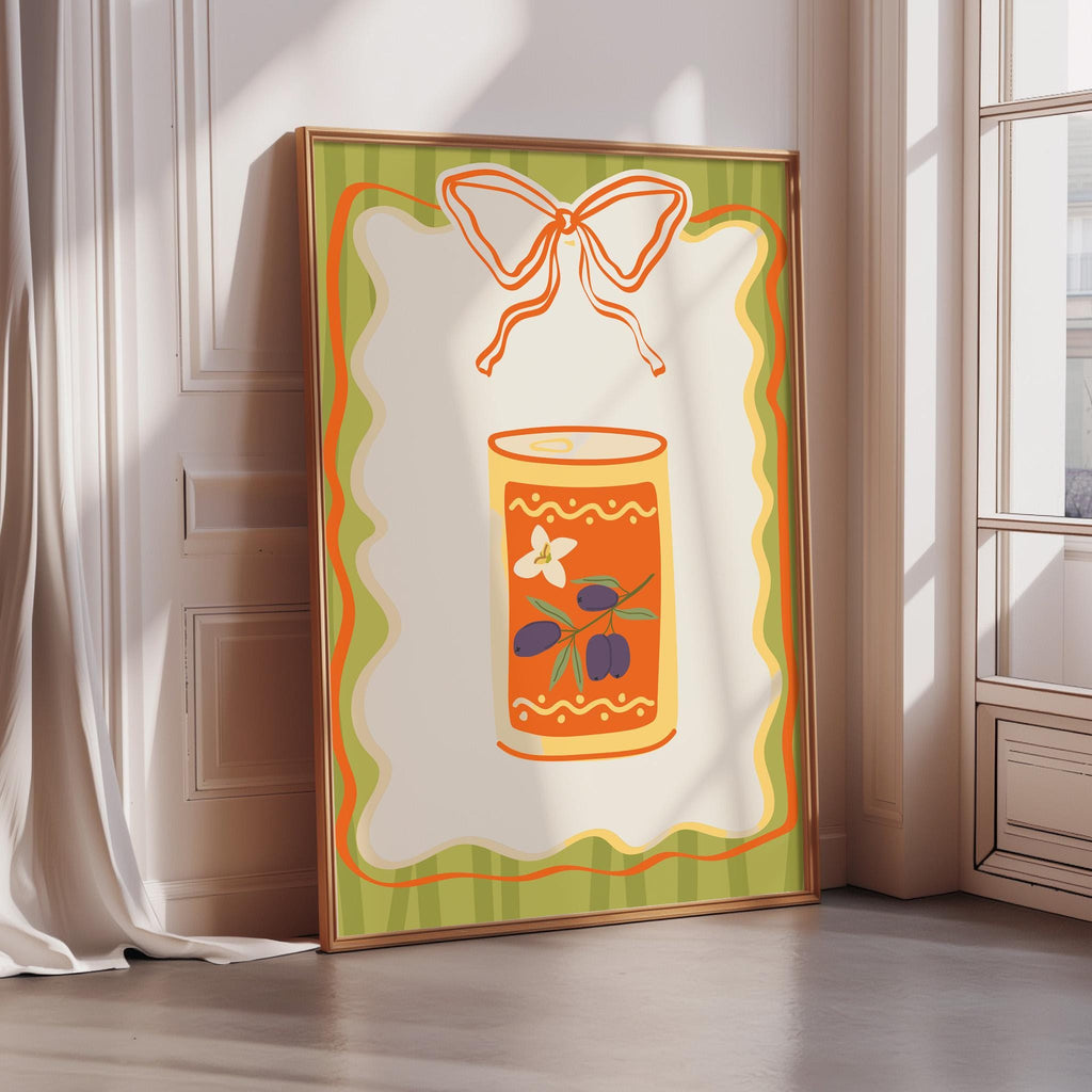 A framed poster with a colorful illustration of a can of olives and a bow on a white background.