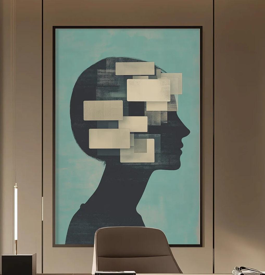 a modern and minimalist office space with a large abstract painting of a head on the wall, a wooden desk with a chair, and built-in bookshelves.