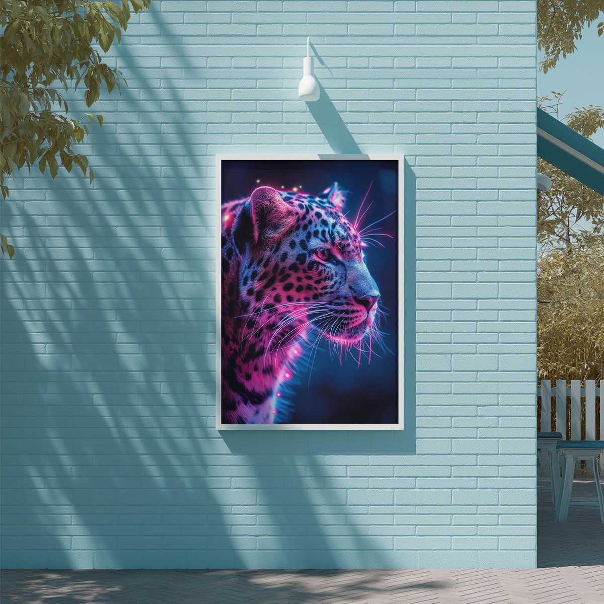 A large framed image of a leopard with a pink and blue glow effect is displayed on a light blue brick wall.