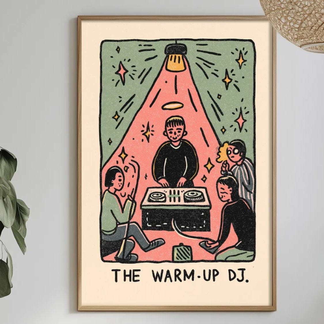a framed illustration of a group of people sitting around a table, with a DJ playing music in the background.