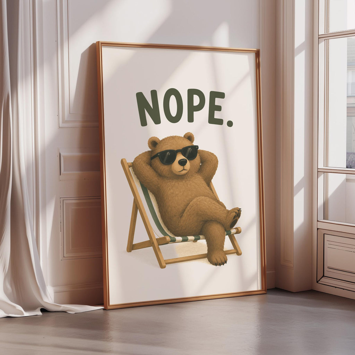 A framed illustration of a bear wearing sunglasses and reclining in a chair with the word "NOPE" above it.