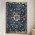 a large, ornate, and intricately designed blue and gold tapestry hanging on a wall in a living room. The tapestry is adorned with a floral pattern and appears to be a decorative piece. The room also includes a white sofa, a wooden side table, and a lamp, creating a cozy and elegant atmosphere.