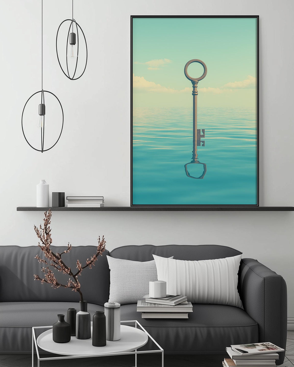 a modern living room with a gray sofa, a coffee table, and a large framed artwork depicting a key floating in a serene body of water.