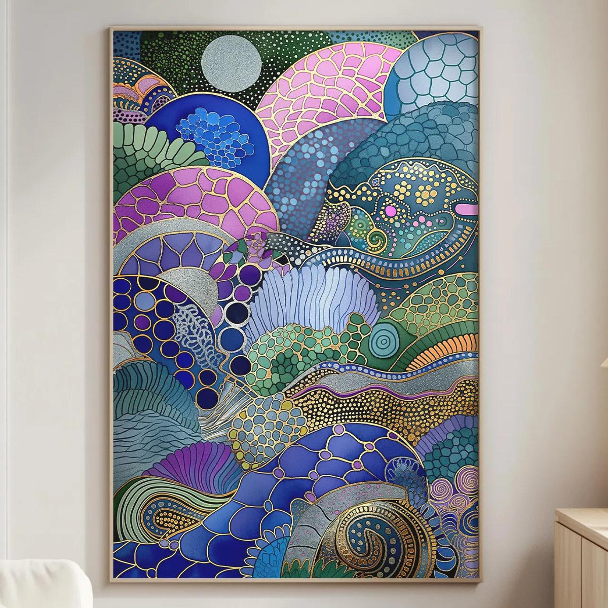 a large, colorful abstract painting hanging on a wall in a living room. The painting is a vibrant display of various shapes, patterns, and colors, creating a visually striking and dynamic composition.