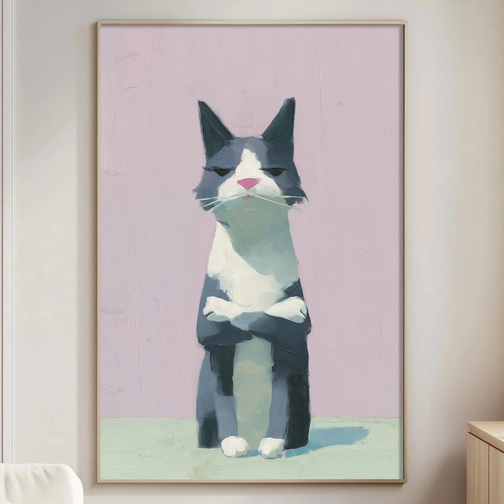 a living room with a large framed painting of a cat on the wall. The cat is sitting on a pink background and appears to be looking directly at the camera. The room also includes a white couch, a wooden side table, and a lamp on a nearby table.