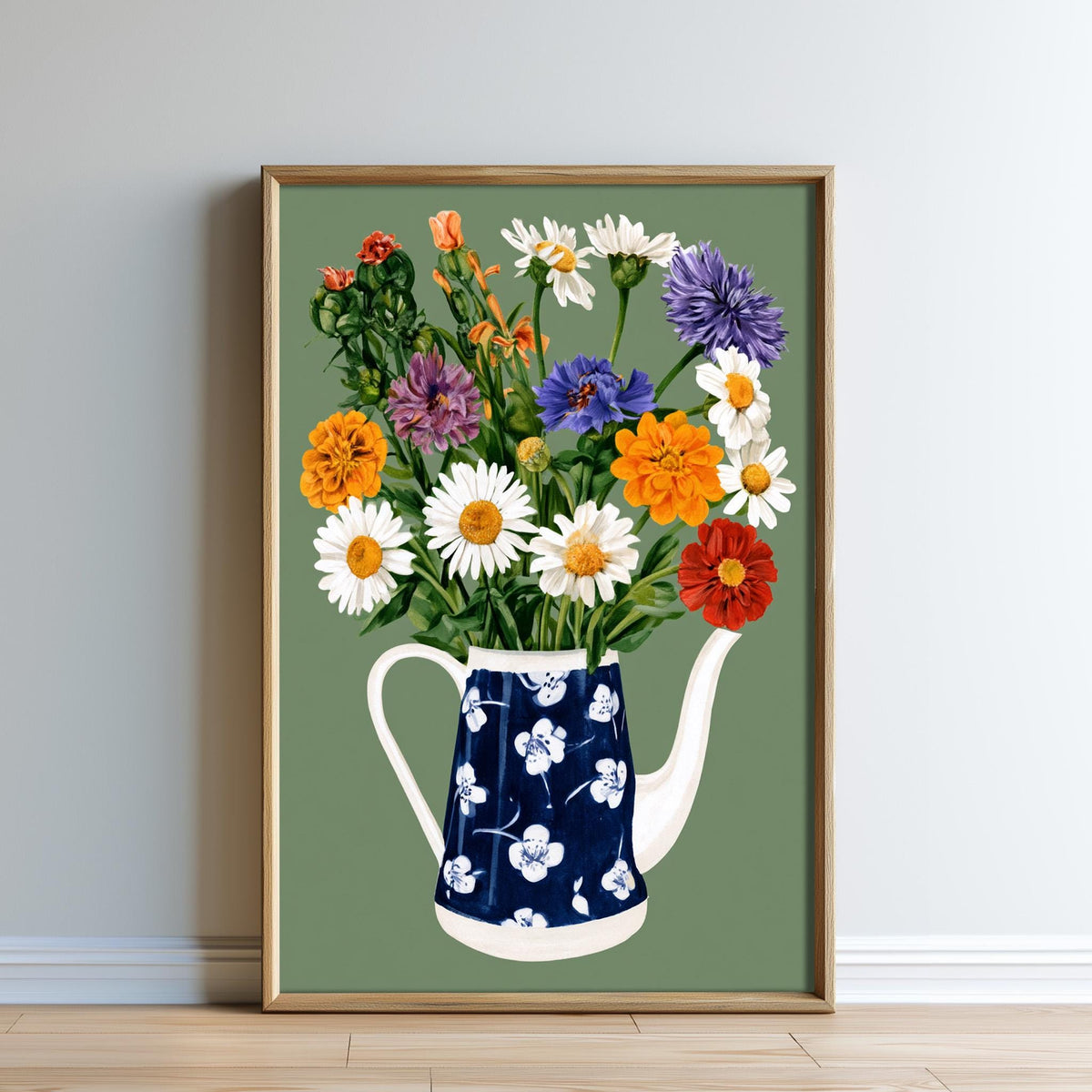 A framed illustration of a blue and white teapot filled with a vibrant bouquet of colorful flowers, including daisies, chrysanthemums, and other blooms.