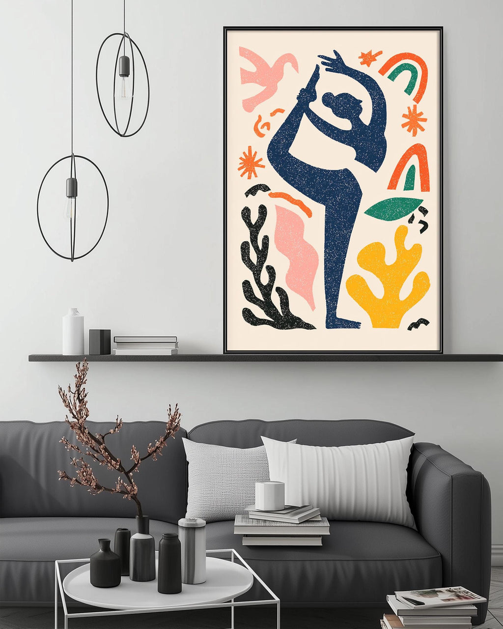 a modern living room with a gray sofa, a coffee table, and a large abstract painting hanging on the wall above the sofa.