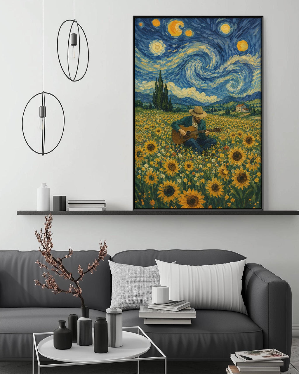 a large painting of a field of flowers with a person sitting in the middle, surrounded by a starry night sky. The painting is hanging on a wall above a gray couch, which has a coffee table in front of it. The room also includes a shelf with various decorative items, such as vases and books.