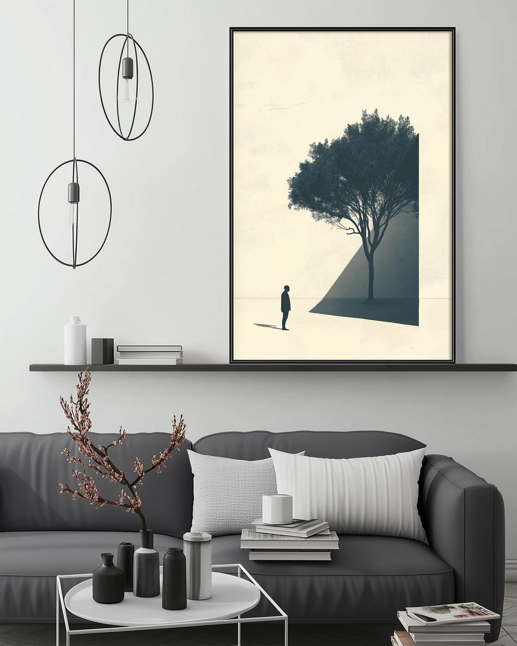a modern living room with a gray sofa, a coffee table, and a large framed artwork depicting a tree and a person standing in the distance.